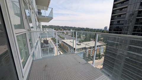 A view from a high-rise building looking down at a cityscape.