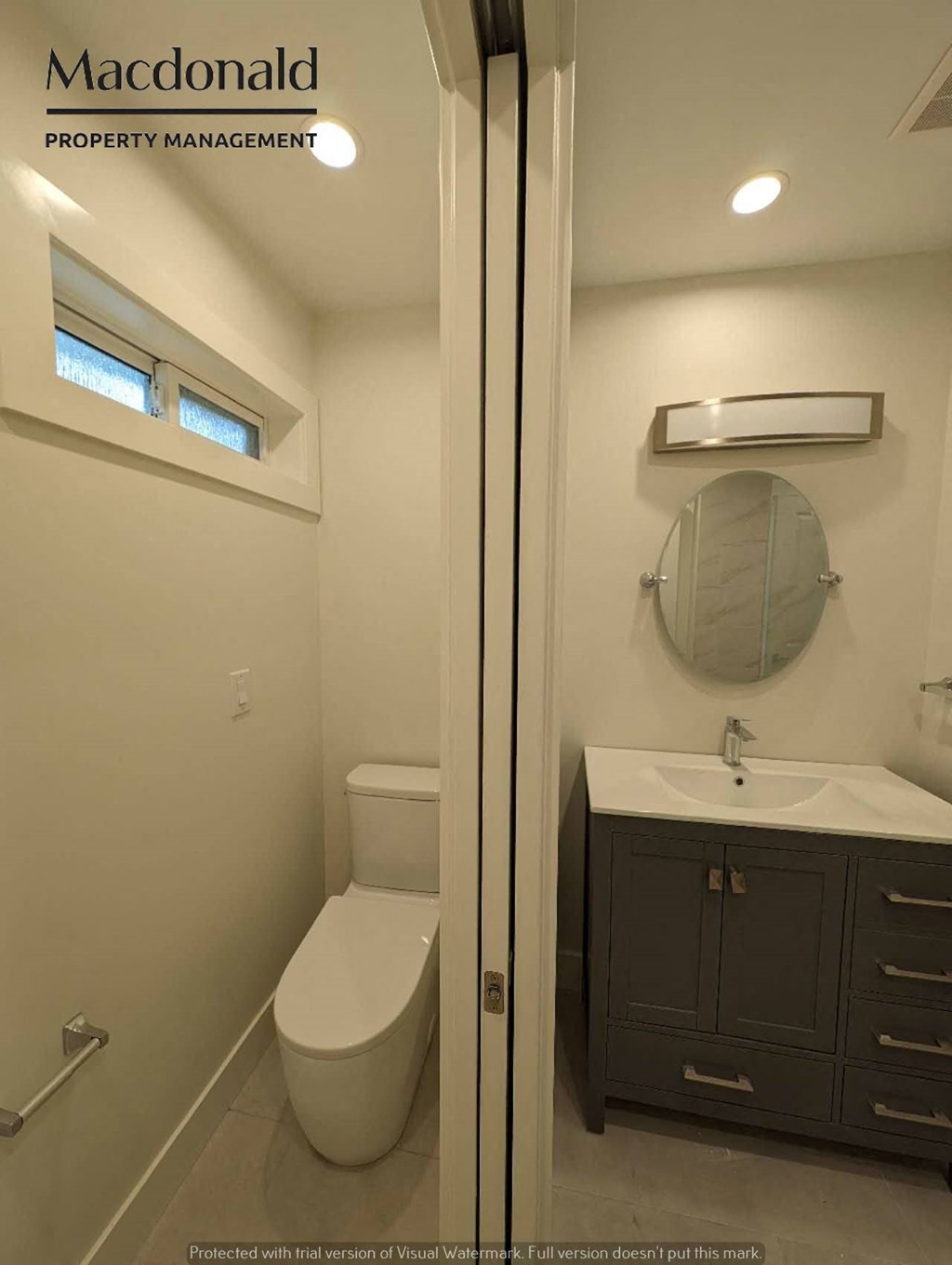 a small bathroom with a toilet and a sink