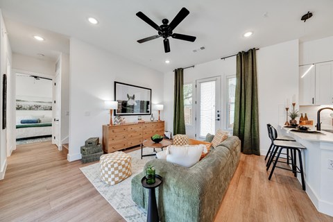 Living room with large couch and entertainment center