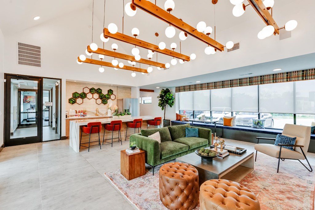 Resident Lounge in the office with bar seating and couches