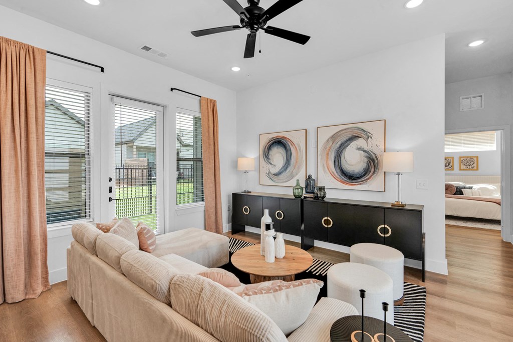 Living room with sectional couch and entertainment center