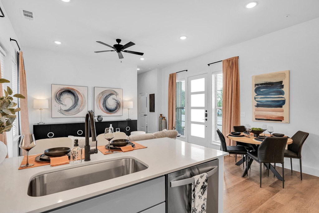Kitchen looking into the dining and living area