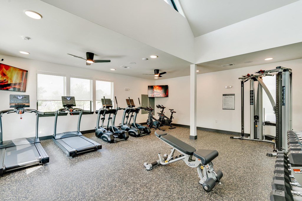 fitness center with ample machines for working out