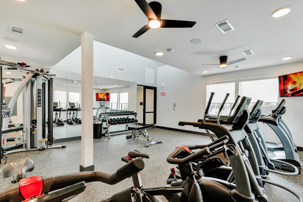 fitness center with ample machines for working out