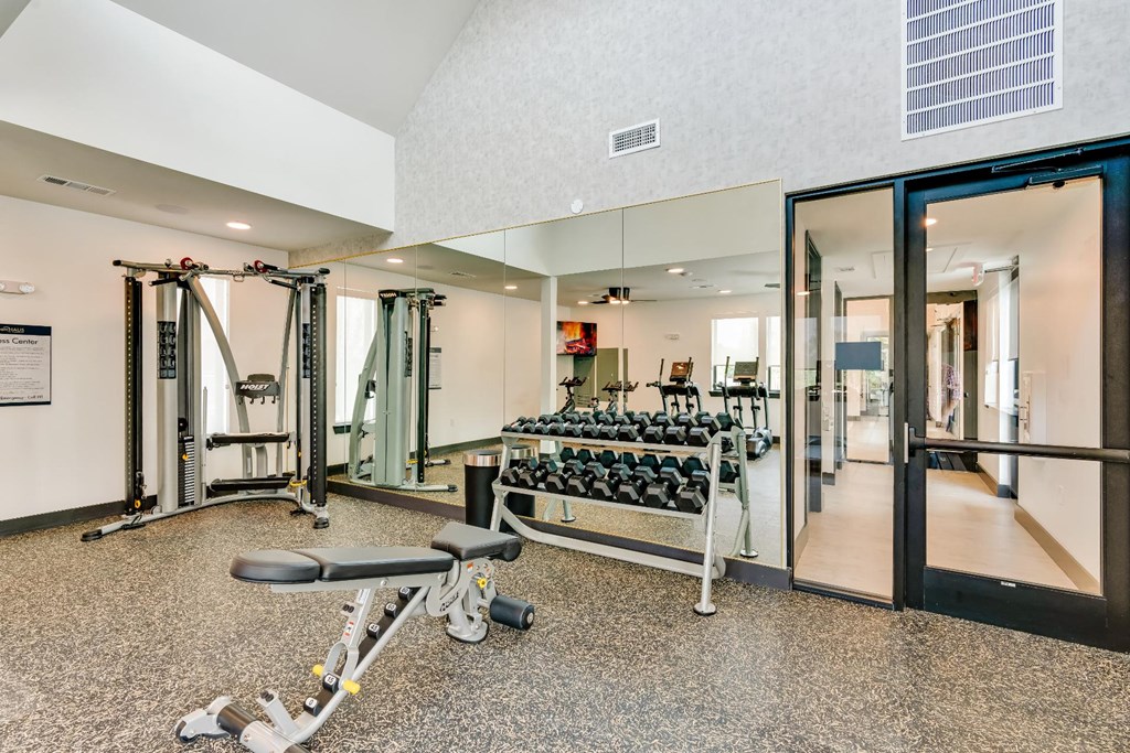 fitness center with ample machines for working out