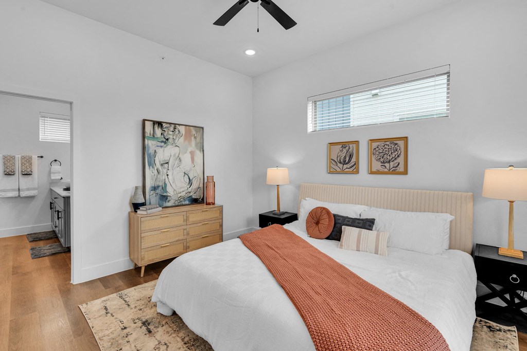 Ensuite bedroom with king sized bed and bedside tables