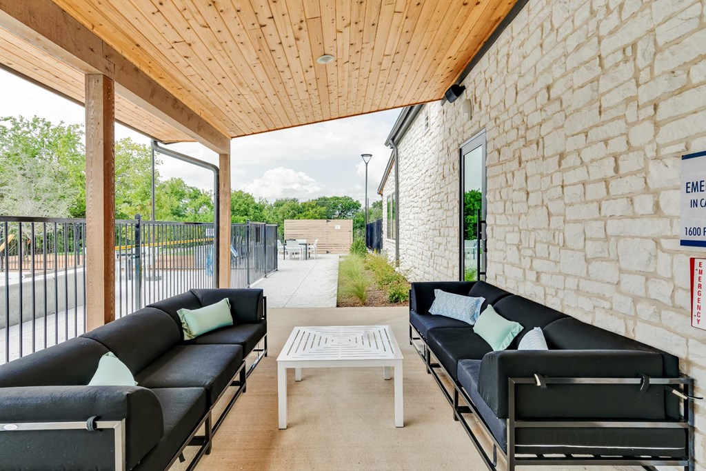 pool with outdoor lounging and seating