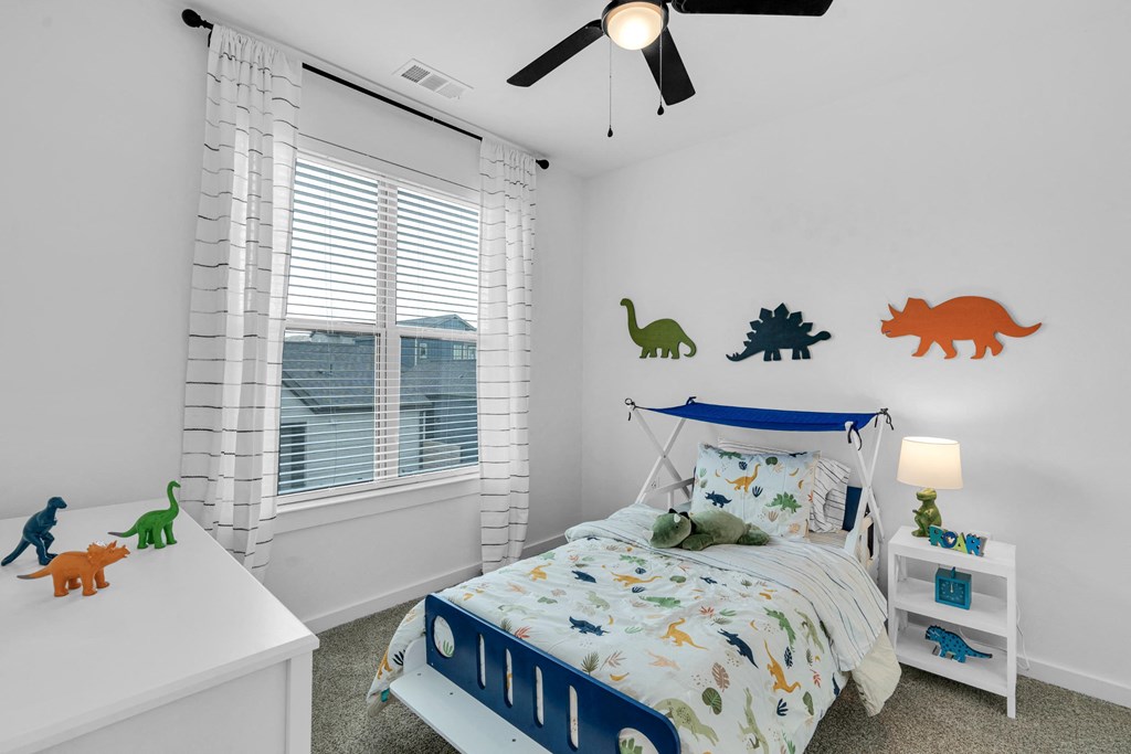 Bedroom with for a boy, decorating with dinosaurs