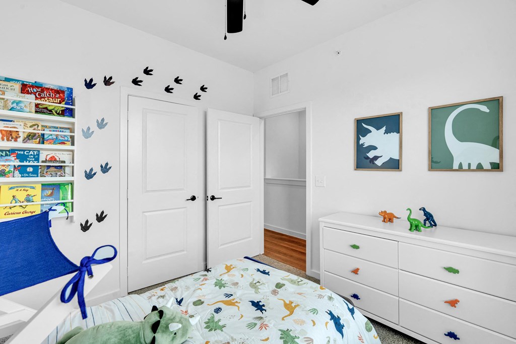 Bedroom with for a boy, decorating with dinosaurs