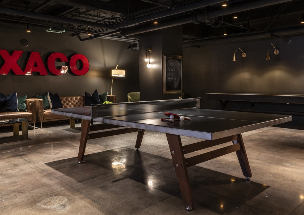 a ping pong table in a game room