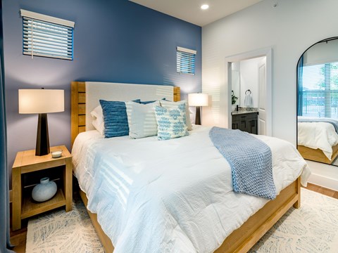 bedroom with king sized bed and bedside tables