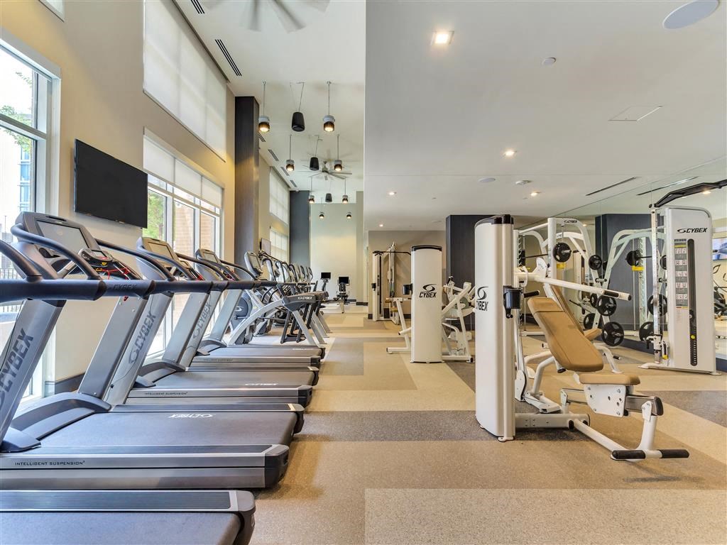 Fitness center with treadmills and cardio equipment.