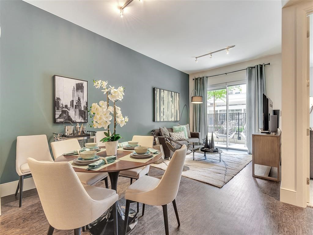 One bedroom apartment at preston hollow village. dining room and living room space