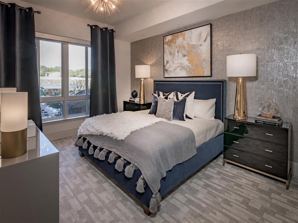 Beautiful master bedroom with large windows