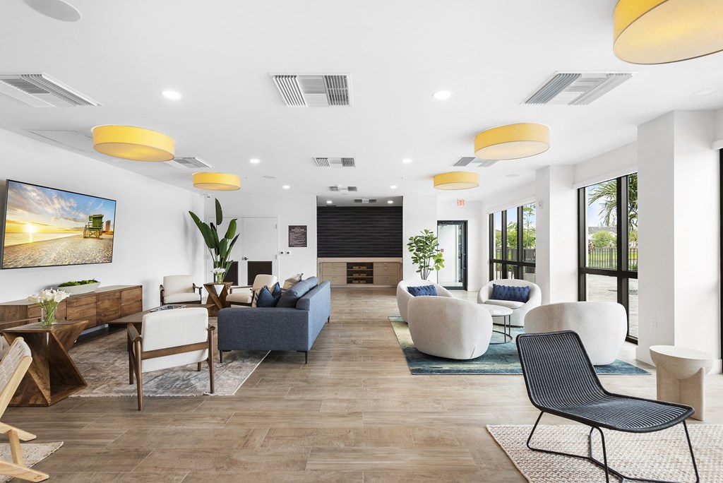A living room with couches and chairs and a table