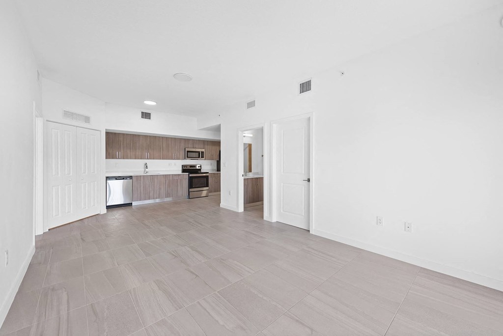 a kitchen and living room in a 555 waverly unit