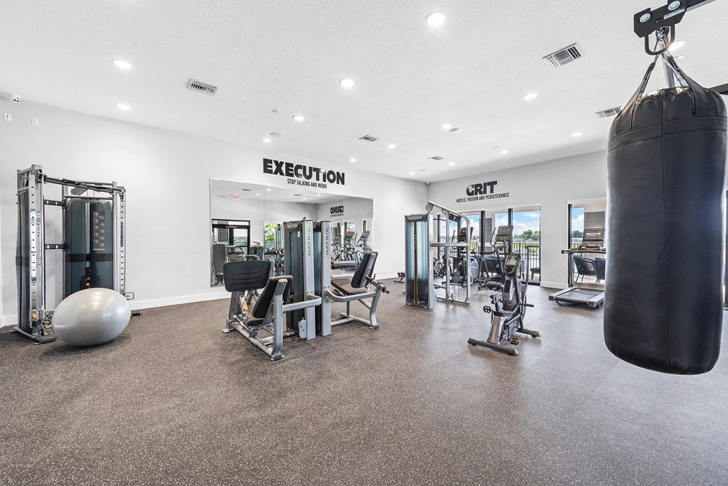 the gym at the enclave at woodbridge apartments in sugar land, tx