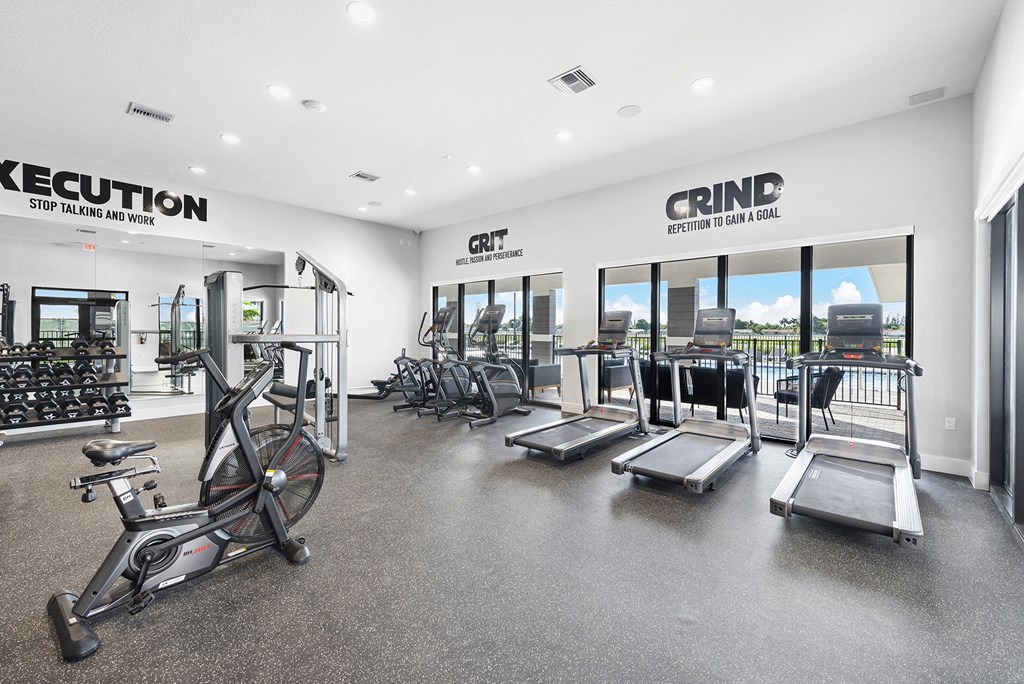 the gym at the enclave at woodbridge apartments in sugar land, tx