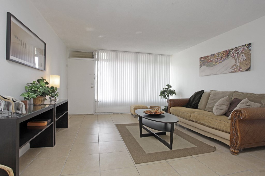 a living room with a couch and a coffee table