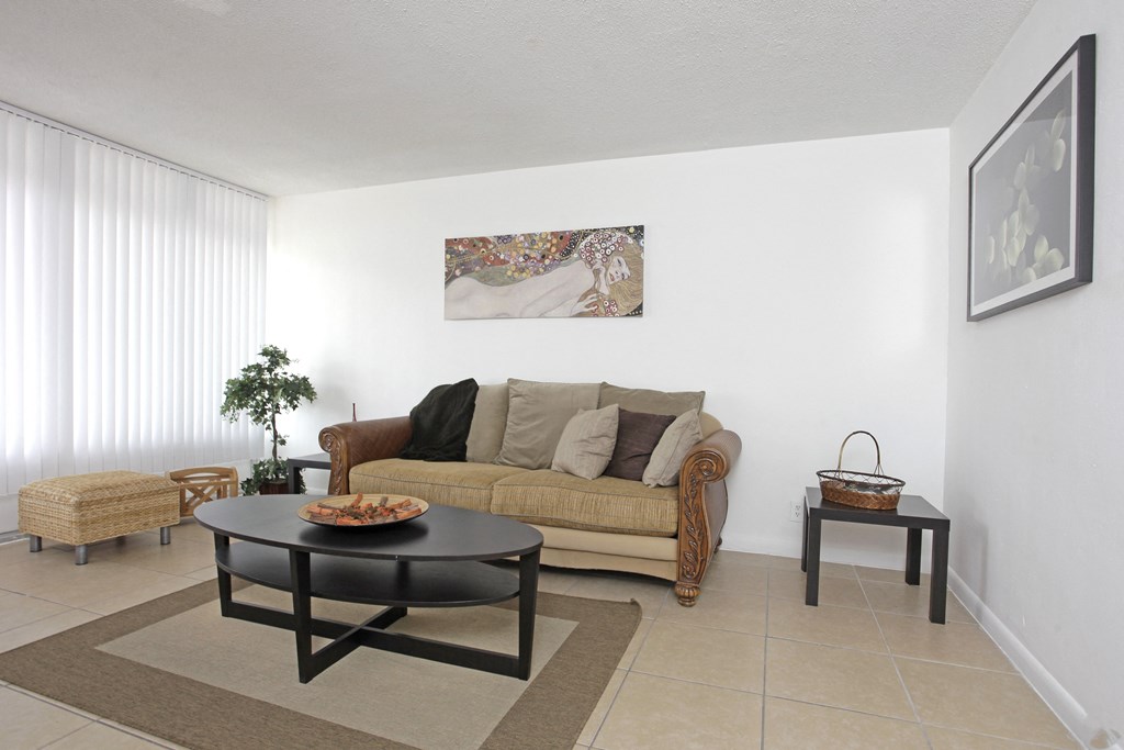 a living room with a couch and a coffee table