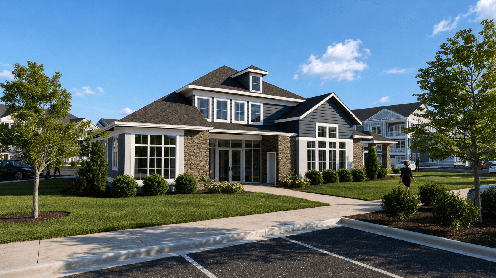 A modern house with a stone facade and a large front yard.