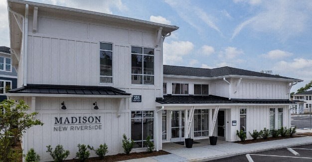 a white building with a sign that says new riverdale