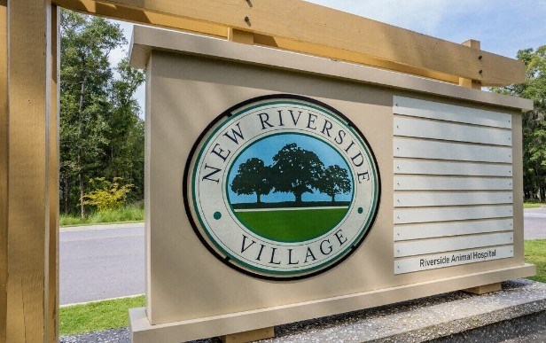 a sign for the new river valley village