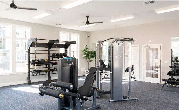 a gym with weights and other exercise equipment