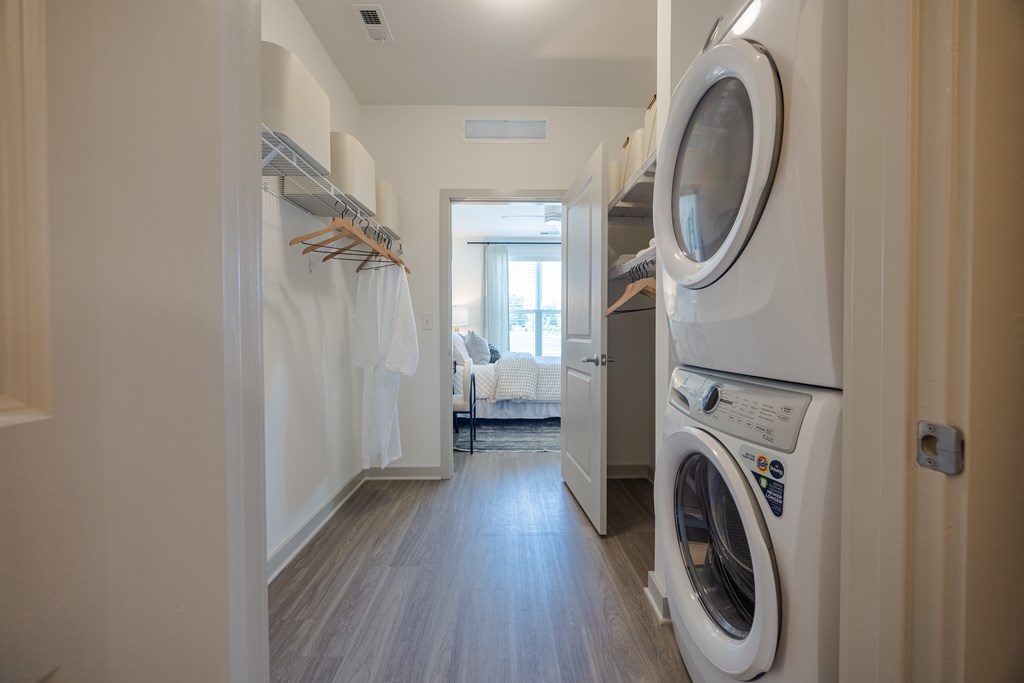 A laundry room with a washer and dryer.