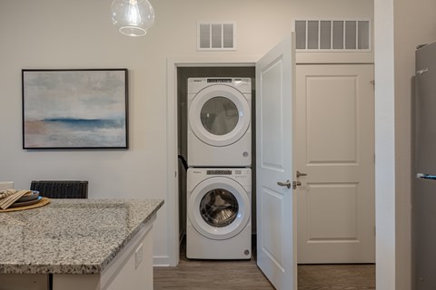 Front Load Washer and Dryer Inside Apartment at Madison Fountains Apartments in St. Johns, Florida