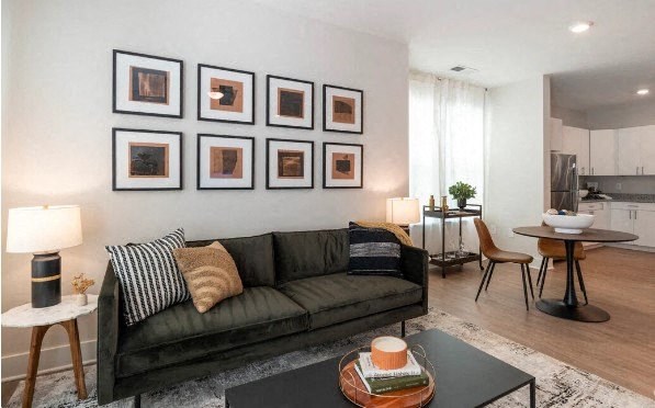 a living room with a couch and a table