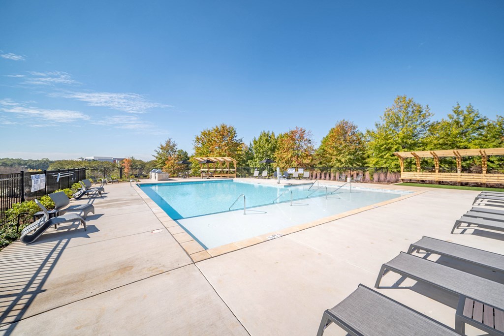 the pool at our crossings apartments with a swimming pool