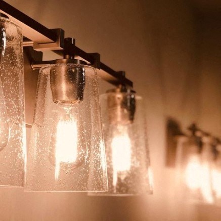 a group of lights hanging on a wall