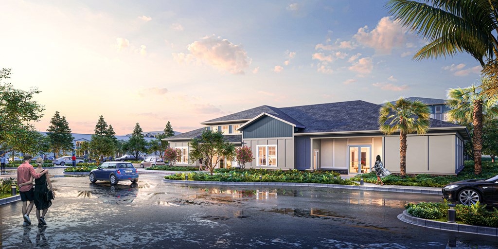 A modern house with a large front yard and a person walking in the rain.