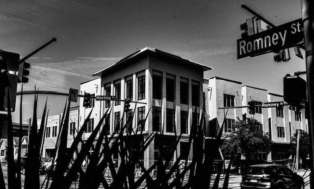 a black and white photo of a building on romney street
