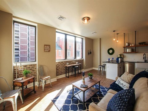 a living room with a couch and a table