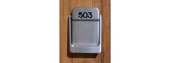 a light switch with the number 503 on it