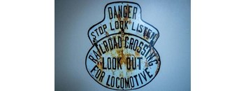 an old sign on the wall of a building