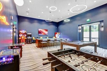 Game Room with Virtual Golf, Billiards, and Arcade Games