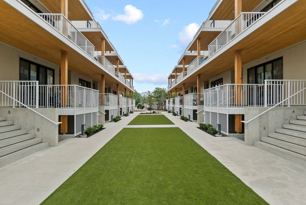 a grassy area in the middle of a building