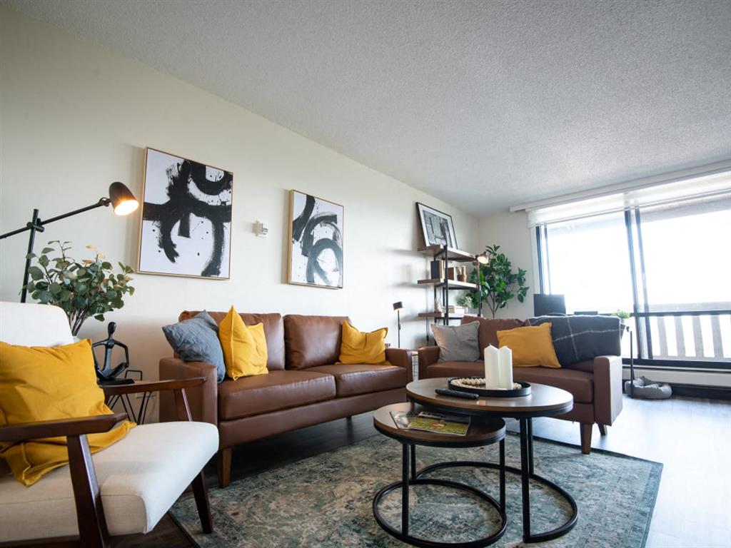 a living room with a couch and a table