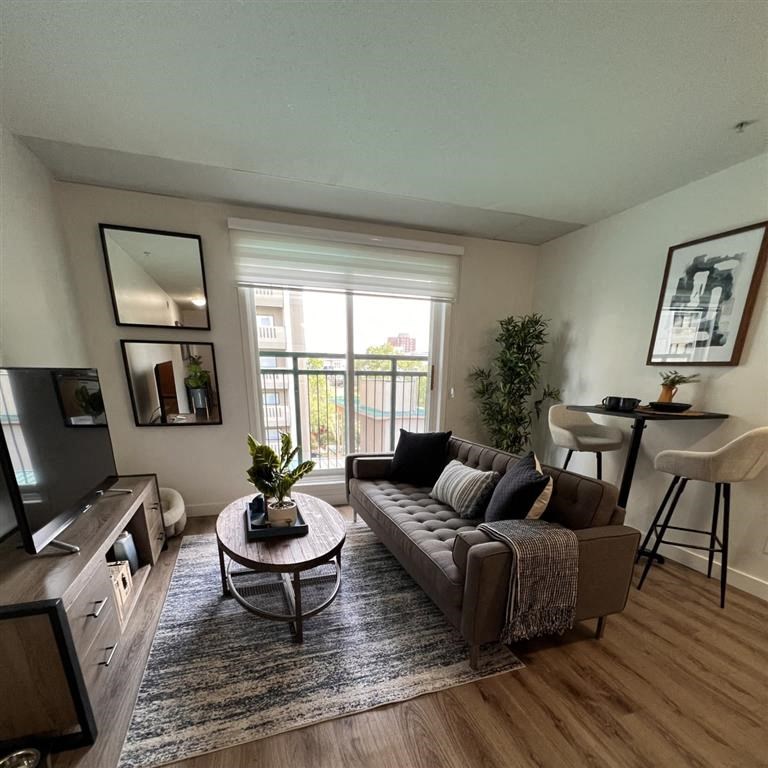 a living room with a couch and a table
