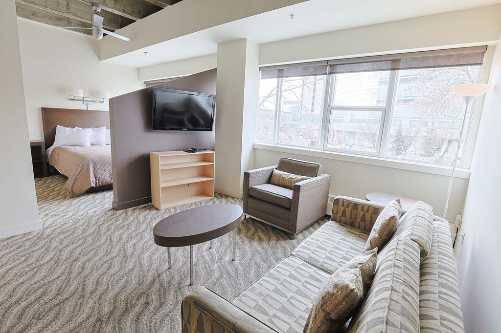 a living room with a couch and a table