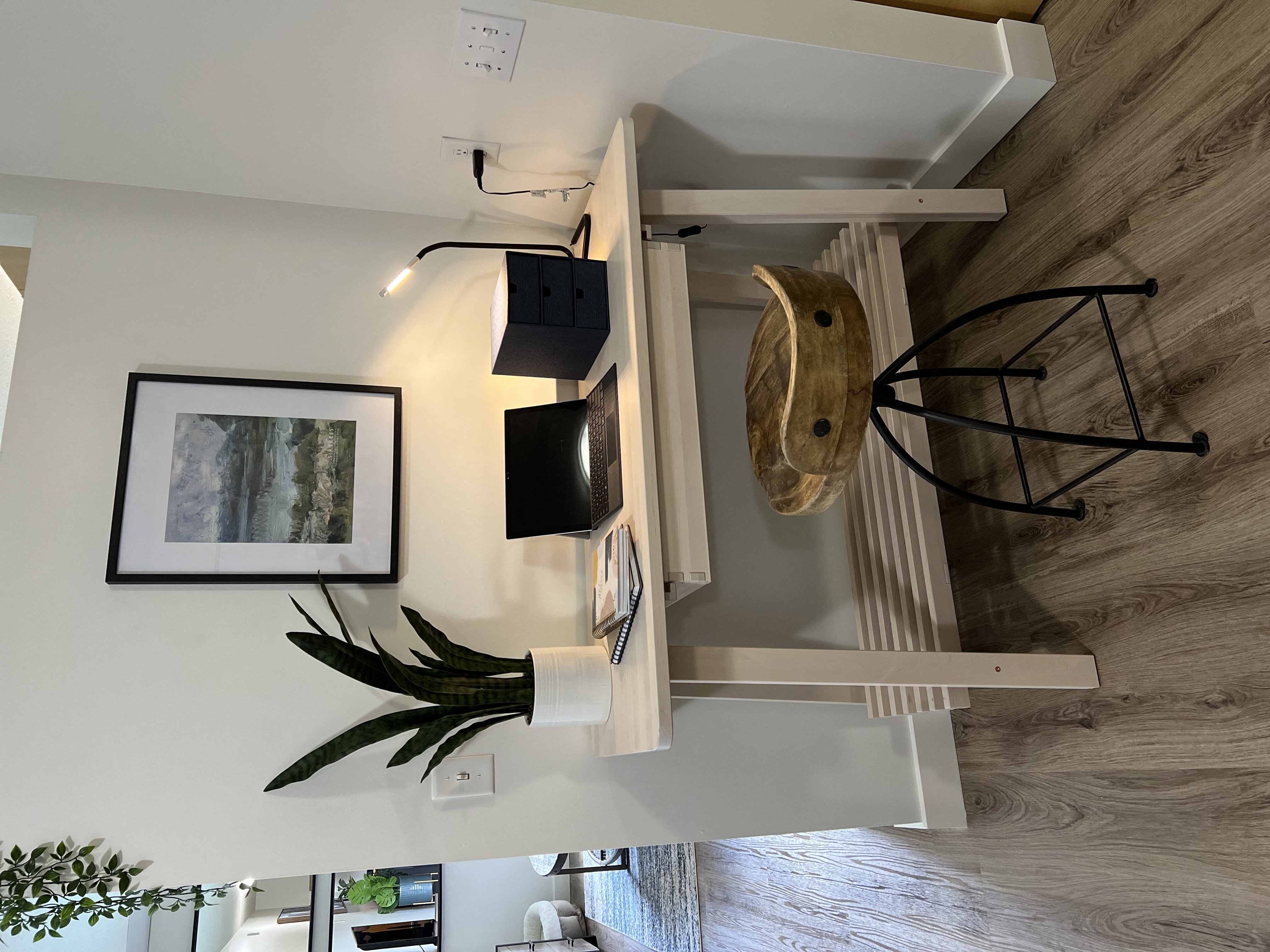 a view of the living room from the top of the stairs