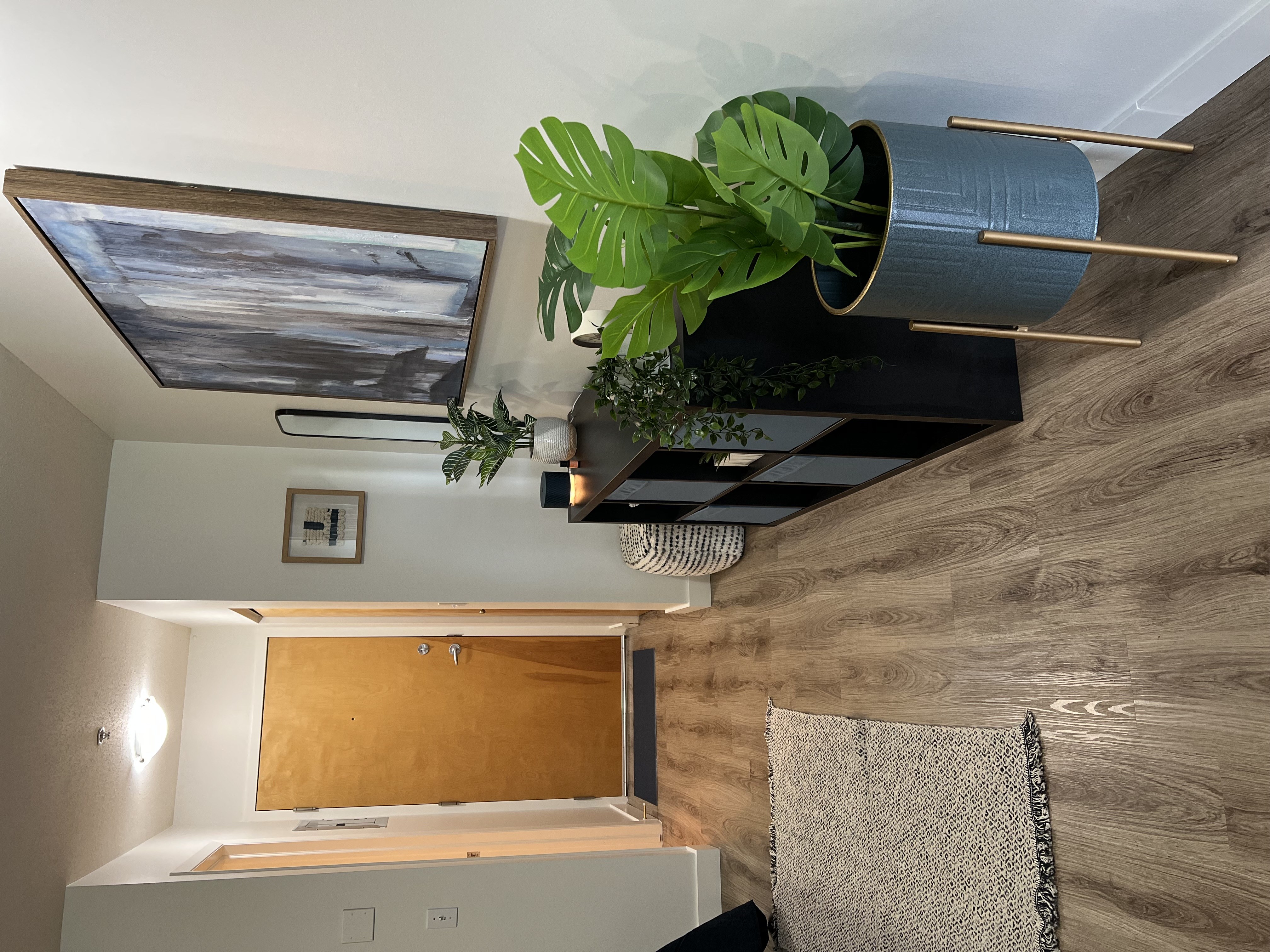 a small bathroom with a sink and a window