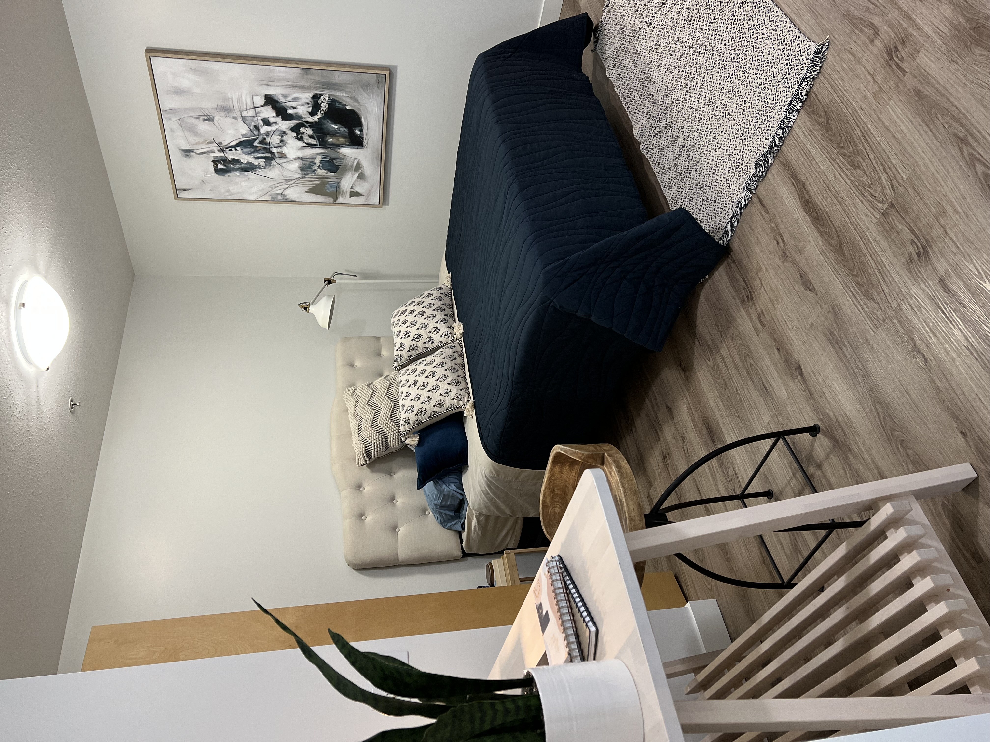 a living room with a couch and chair