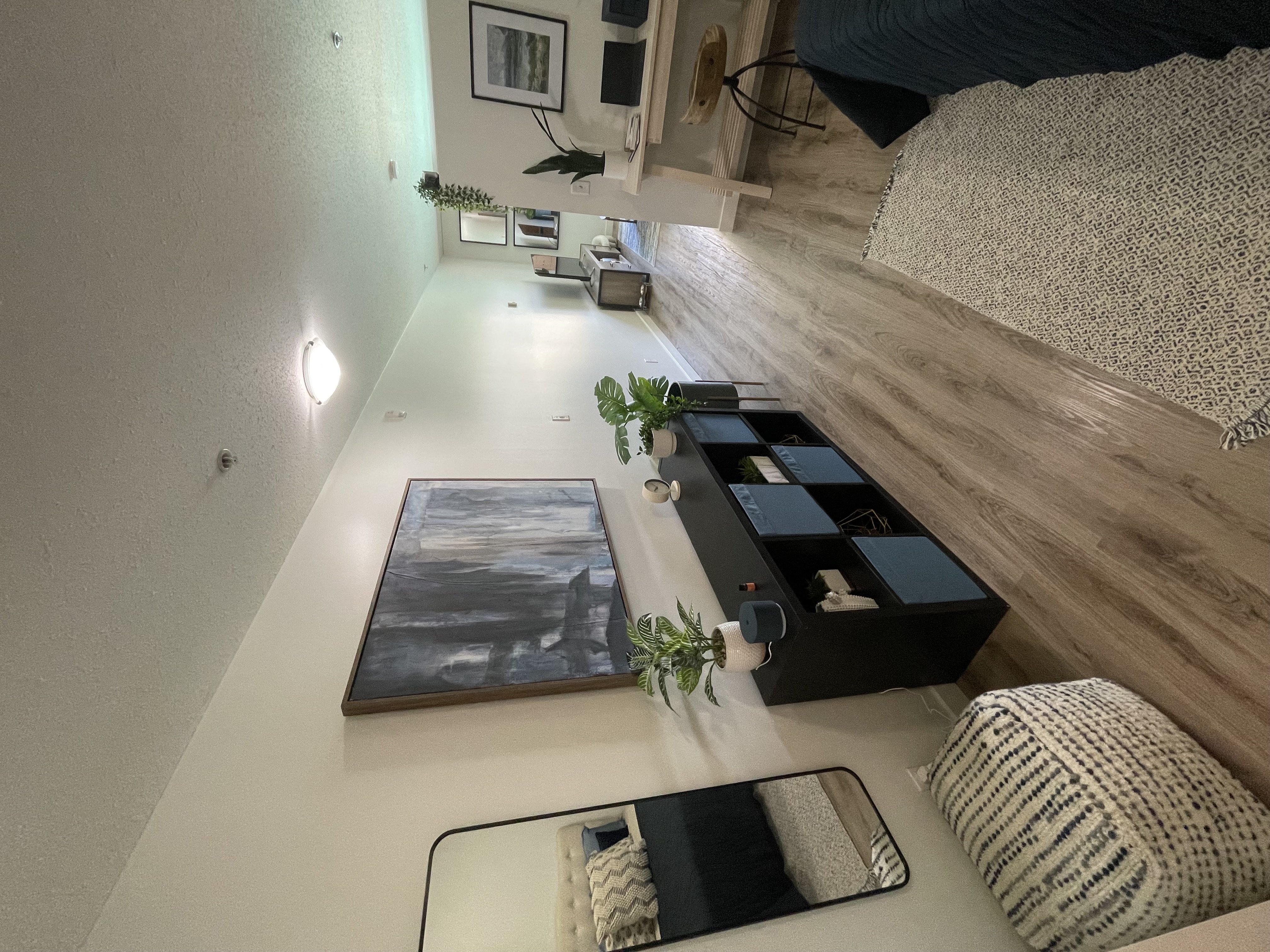 a small living room with a couch and a table