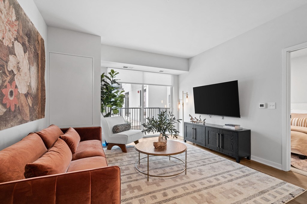 a living room with a couch and a tv
