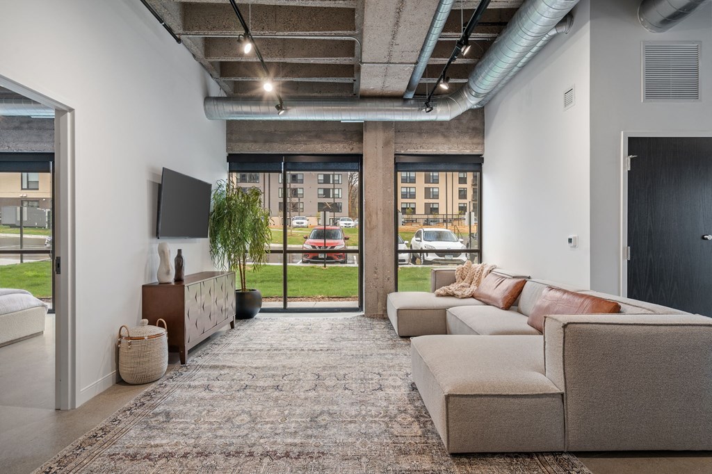a living room with a couch and a tv