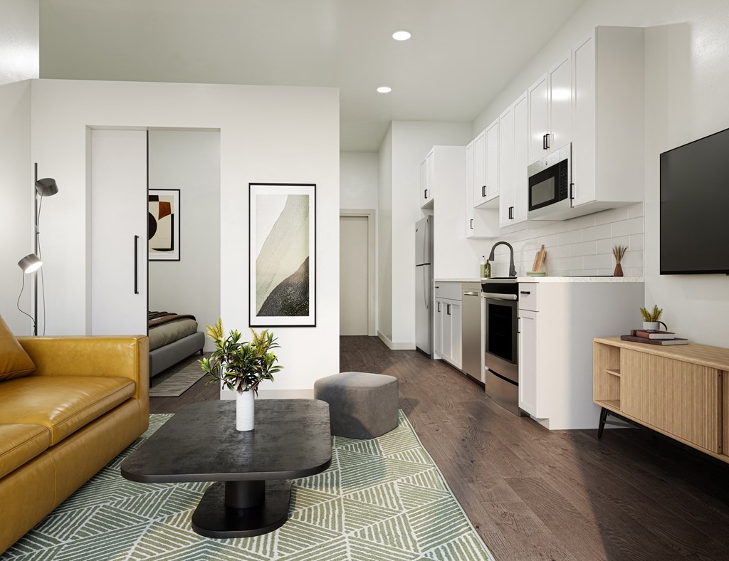 a living room with a couch and a table